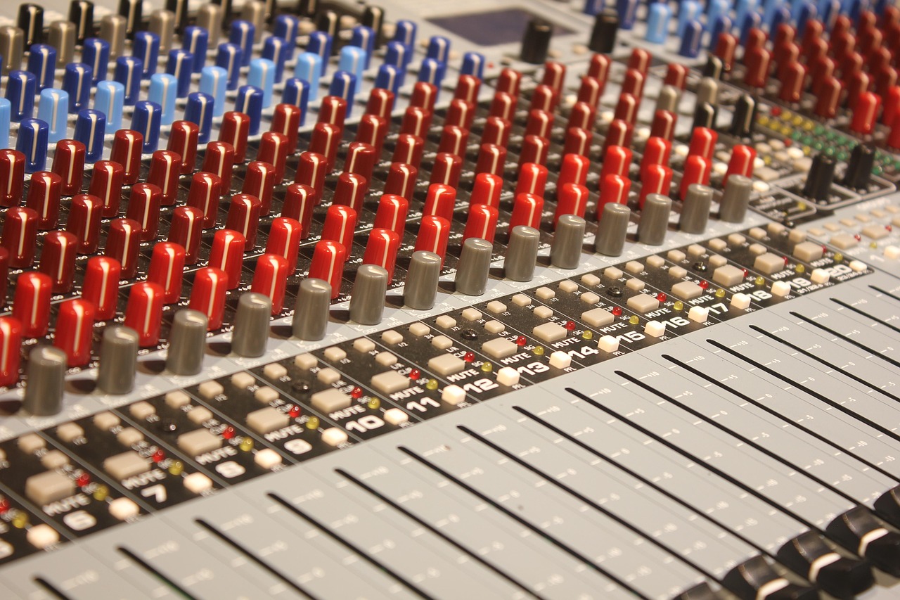 Professional audio mixing console and sound engineering board in studio environment
